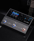 GP-180 Multi-Effects Guitar Processor with HD Modeling on amp with guitar, showing knobs and control panel