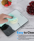 Digital Kitchen Scale 22lb 10kg USB C Rechargeable With Tempered Glass Top Easy Clean LED Touch Screen being wiped clean