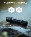 Rechargeable EDC Flashlight 1800 Lumen Output Beast Mode Bright Pocket Light in rugged waterproof design on wet rocks
