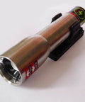 Stainless Steel LED Flashlight With 171 Lumen Output Pure Beam Focusing Optic on black mount, angled view