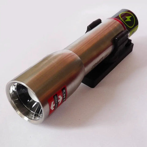 Stainless Steel LED Flashlight With 171 Lumen Output Pure Beam Focusing Optic on black mount, angled view