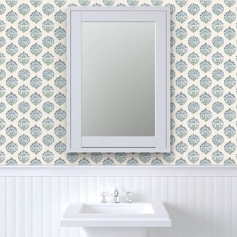 Sick Periwinkle Matte Wallpaper With Subtle Linen Texture covering a bathroom wall with a white sink and mirror.
