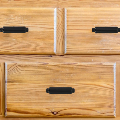 2 Pack Zinc Alloy Cabinet Handles For Drawers And Wardrobes, black metal pulls on wooden drawer surface