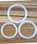 5 Pack Silicone Sealing Rings Replacement Gaskets For Coffee Pot Lids Espresso Pots And Canning Jars on wooden surface