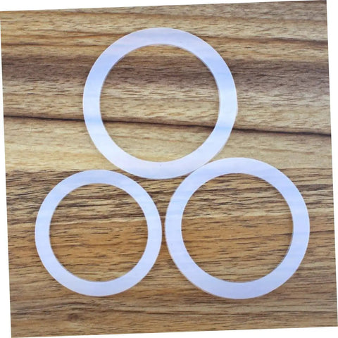 5 Pack Silicone Sealing Rings Replacement Gaskets For Coffee Pot Lids Espresso Pots And Canning Jars on wooden surface