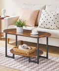 Oval Wood Coffee Table With Dual Open Storage Shelves Chill Farmhouse Vibe For Cozy Living Rooms And Home Offices Rustic Brown Finish Sturdy Base in a cozy living room setting with accessories.