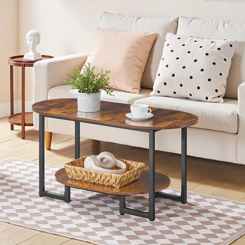 Oval Wood Coffee Table With Dual Open Storage Shelves Chill Farmhouse Vibe For Cozy Living Rooms And Home Offices Rustic Brown Finish Sturdy Base in a cozy living room setting with accessories.