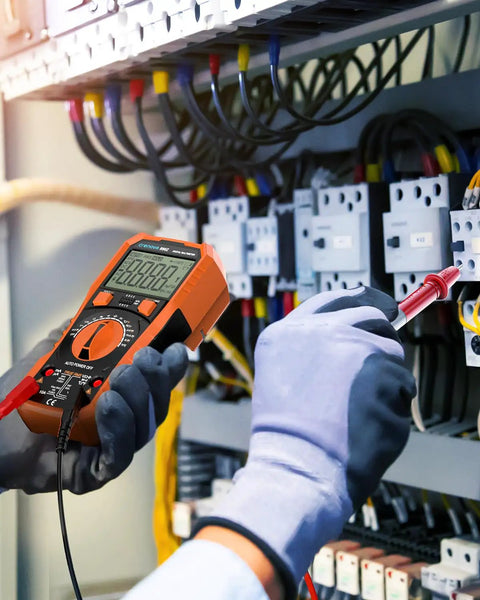Technician using 6000 Counts TRMS Digital Multimeter With NCV And Auto Ranging, Measures AC DC Voltage And Current, in electrical panel