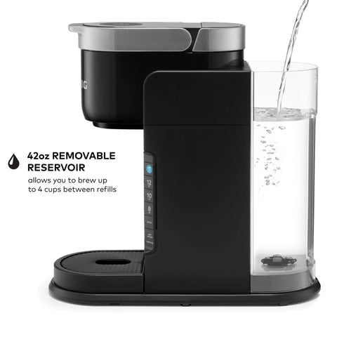 Side view of Barista Style Single Serve Coffee Maker With Built In Milk Frother For Hot Or Iced Lattes And Cappuccinos, Three Brew Sizes, Two Oz Shot Button, Works With Any K Cup Pod, Black showing 42 oz removable reservoir being filled with water.