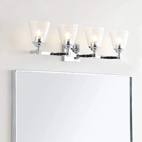 Chrome 4-Light Vanity Light Wall Sconce With Clear Seeded Glass Shades mounted above bathroom mirror, 28.5 inch long.