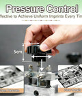 Adjusting pressure knob on Must Have Engraving Print Making Machine With Manual Press For Slick Printmaking emphasizing control.