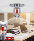 Heavy Duty 10 Pack Fire Sprinkler Heads Boasting 155F Upspray Shield And Straight Up Smooth Plug In Half Inch Threads For Any House Or Garage spraying water in an office setting.