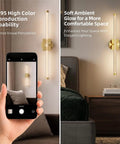 Image showing JTsupliight Wall Sconces Set of Two, 22.17" Rechargeable Wall Lights, Gold illuminating a cozy bedroom.