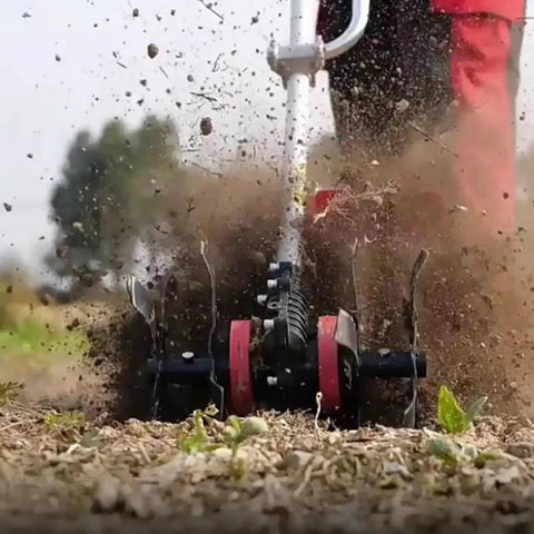 Nine Teeth Disc Harrow For Grass Mower Tiller Scarifier Attachments in action, tilling soil with aluminum alloy disc wheels