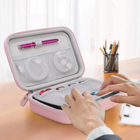 Person organizing cables in a Heavy Duty Travel Electronic Organizer Case With Sleek Cable Pouch For Chargers And Gadgets.