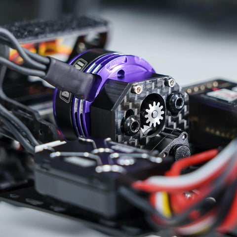 Close-up of Fat Viper 2204 2400KV Brushless Outrunner Motor with mount installed on RC crawler Axial SCX24 model