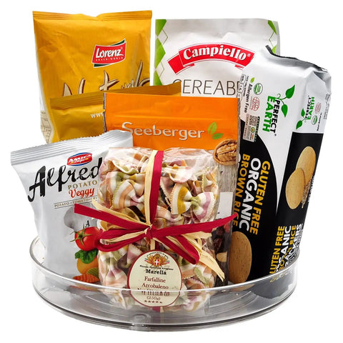 Clear Acrylic 11 Inch Lazy Susan Organizer With A Super Smooth 360 Spin That Makes Taming Kitchen Clutter An Absolute Game Changer For Pantries And Fridge Storage filled with snacks and pasta.