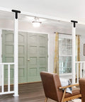 Room interior with Black T Bracket Set For Wood And Steel, Post To Beam Connectors, used for pergola rafters repair and reinforcement.