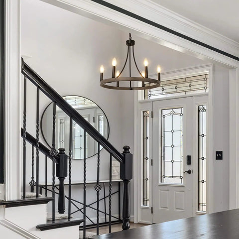 Wagon Wheel Chandelier For Dining Room, 6 Light Farmhouse Pendant With Wood Grain Finish in a modern foyer setting
