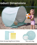 Pop Up Baby Beach Tent With UV Protection Lightweight Beach Shelter For Kids with a child on the sand. Includes carry bag.
