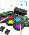 Roll Up 9 Pad MIDI Electronic Drum Set With Headphone Jack Built In Dual Speakers, sticks and pedals visible