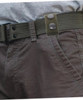 Side view of Six Pack Durable Nylon Belt Buckle Quick Release Webbing Clips worn on pants for outdoor activities.