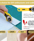 Close-up of All-In-One Sewing And Quilting Kit With 45mm Rotary Cutter A3 Cutting Mat Fabric Scissors Three Replacement Blades Two Quilting Rulers No Fuss Sewing Clips used on fabric.