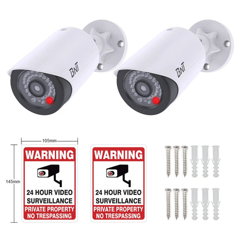 Realistic Fake Surveillance Camera 2 Pack With LED Light For Indoor Outdoor Security Dome Look Dummy CCTV Camera With Alarm Sticker Keeps Crooks Away White, includes cameras, alarm stickers, and installation hardware.