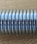 Rock Solid Zinc Plated Extension Springs 3 Inch Free Length Zero Zero Niner Three Wire Diameter Three Five Lbs Initial Tension 40 Lbs Max Load Music Wire Workhorse Grade Industrial Replacement Pack Of 36 Units, close-up view.