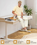 Sit Stand Desk With Drawers And Shelves 47 By 23.6 Inch Electric Height Adjustable Standing Desk In Use With Man and Dog