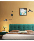 Slick Adjustable Double Head Wall Sconce Lamp In Modern Black Finish With Swivel Pole Design for cozy bedroom reading vibes.