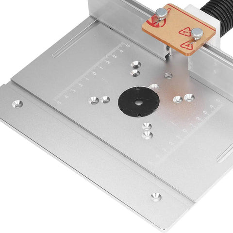 Badass Aluminum Router Lift System Kit With Smooth 180 Degree Rotation For Woodworking Enthusiasts And Inverted Routing Projects Featuring Durable Cnc Anodized Insert Plate For Hassle Free Milling And Carving Builds - close-up of the aluminum router lift insert plate with measurement markings.