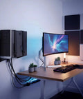 Universal PC Wall Mount Rock Solid Metal Support Bracket For Desktop Towers And CPUs, installed with adjustable straps