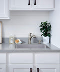Parkwood Single Handle Pullout Kitchen Faucet With Dual Sprayer Aerated Stream Or Spray Stainless Finish ADA Compliant in modern kitchen