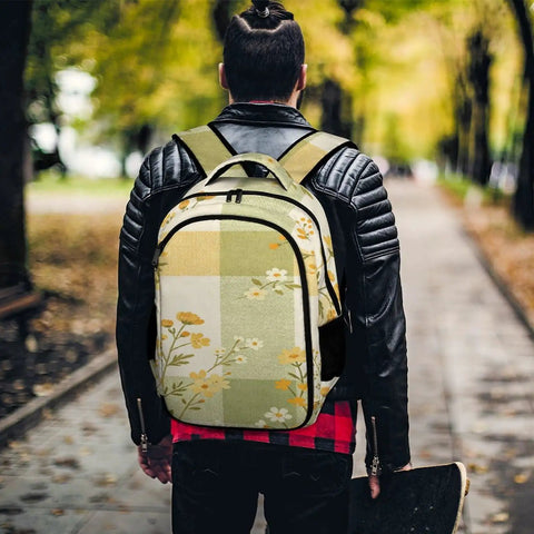 Person wearing Yellow Green Plaid Floral Print Backpack For Everyday Use, Unisex Large Capacity Daypack in park