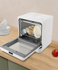 Heavy Duty Countertop Dishwasher With Four Smart Wash Cycles And Wide 360 Degree Rotating Spray And Super Roomy Mini Dishwasher, opened with dishes.