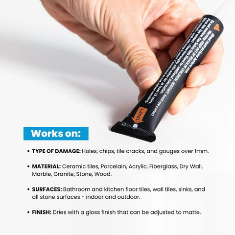 Hand holding Tile Repairezy Ceramic Tile Chip Repair Kit Beige, DIY Friendly, Durable Porcelain Tile Filler tube near instructions.