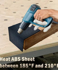 Heating a Black Plastic Sheet One Eighth Inch Thick Twelve By Twelve Inch Heavy Duty Two Pack Rigid Moldable Panel for DIY use