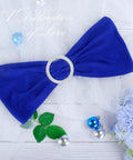 Royal Blue Spandex Chair Sashes Set Of 30 With Buckle Slider, ideal for wedding and banquet decor, shown with elegant floral accents.