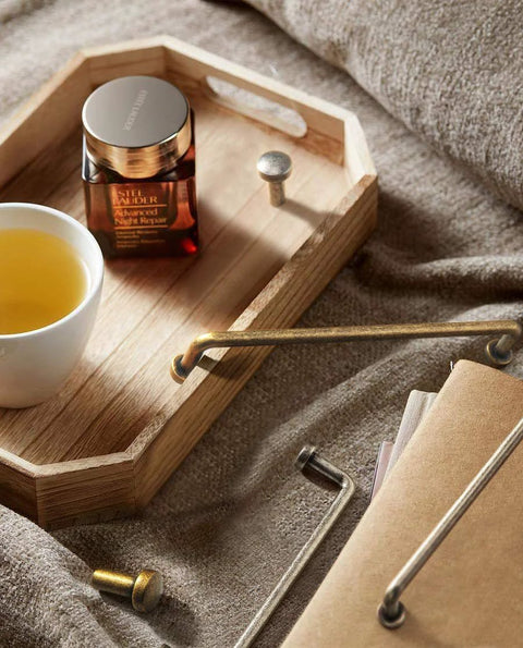 6 Pack 5 Inch Center To Center Antique Brass Cabinet Bar Pulls on a tray with tea and a jar, home improvement hardware.