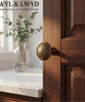 Antique Brass Cabinet Knobs 10 Pack Tough As Nails Heavy Duty Zinc Alloy Round 1.4 Inch Dia Kitchen Cabinet Handles installed on wood