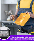 Front view of worker with yellow case of 120Pcs torsion springs assortment kit; stainless steel springs in 30 sizes.