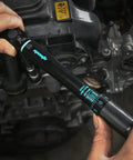 Click Torque Wrench With One Quarter Inch Drive, 20 To 200 Inch Pounds, Durable Chrome Vanadium in use on engine parts.