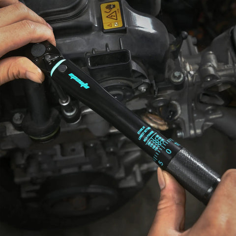 Click Torque Wrench With One Quarter Inch Drive, 20 To 200 Inch Pounds, Durable Chrome Vanadium in use on engine parts.