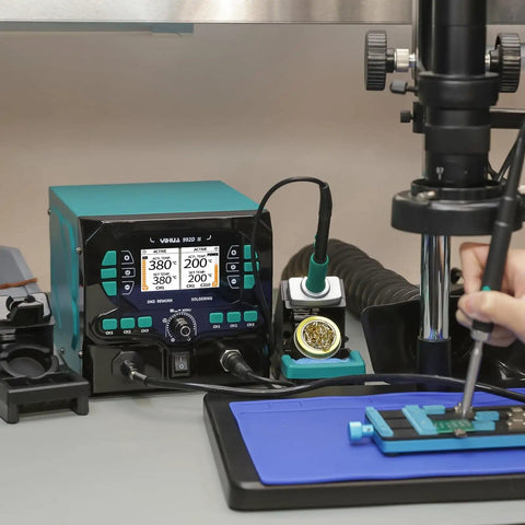 992D-II 2-In-1 Precision Soldering Kit with Hot Air Pencil and C210 Soldering Iron in use on a PCB under microscope