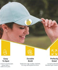Woman with hat featuring Pineapple Shaped Golf Ball Marker For Alignment And Game Changer Putting Green Precision Metal Ball Marker 1 Inch Wide