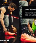 Athlete wearing ZAMST ankle brace, tying bright orange sports shoe during basketball game preparation.