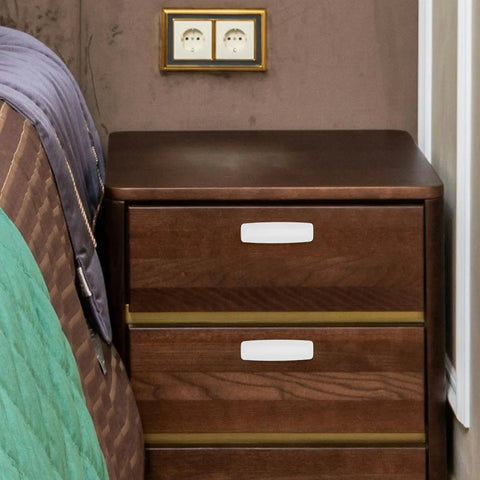 Top Grade No Hassle Self Adhesive Cabinet Handles Pair White Pp Drawer Knobs on wooden drawer in bedroom setting.