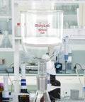 Borosilicate Glass Buchner Filtering Funnel With Fine Frit G3 94mm ID and Vacuum Serrated Tubulation, 500ml Capacity in lab setting.