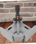 Heavy Duty Right Angle Clamp For Woodworking And Precision Welding With Badass Aluminum Build No Sweat Single Handle Design For Hella Tough 90 Degree Corners Every Time on wooden surface.